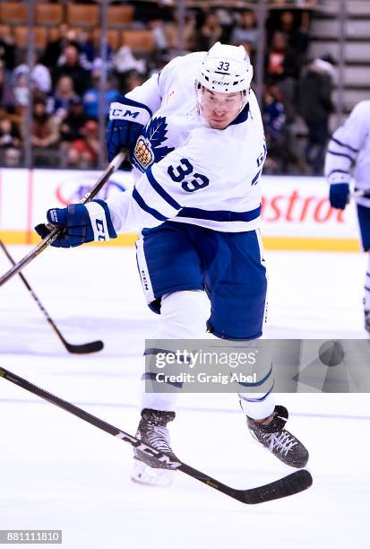 Frederik Gauthier of the Toronto Marlies takes a shot against the Belleville Senators during AHL game action on November 25, 2017 at Air Canada...