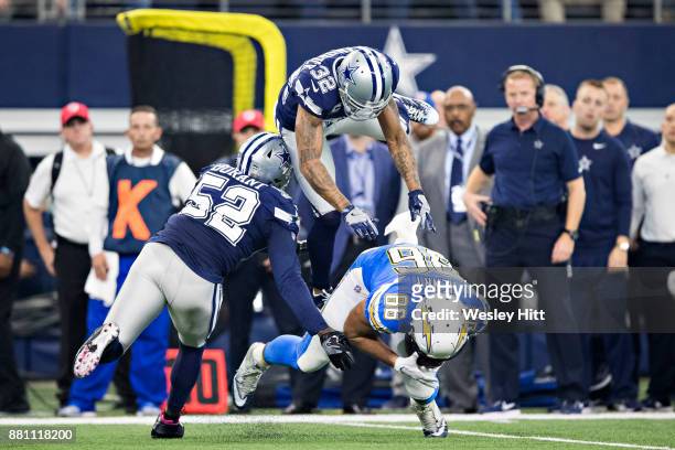 Justin Durant and Orlando Scandrick of the Dallas Cowboys tackle Hunter Henry of the Los Angeles Chargers at AT&T Stadium on November 23, 2017 in...