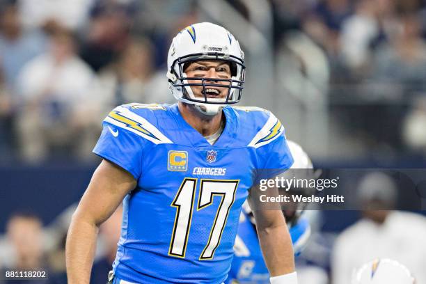 Philip Rivers of the Los Angeles Chargers yells out a play during a game against the Dallas Cowboys at AT&T Stadium on November 23, 2017 in...