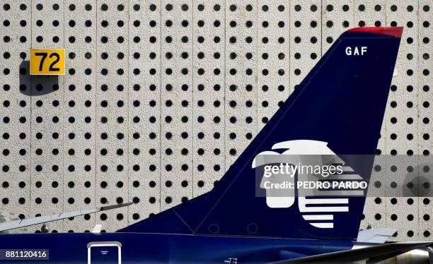 An airplane of Aeromexico sits on the tarmac at Mexico City's international airport, on November 28 as pilots of the Mexican flag carrier airline...