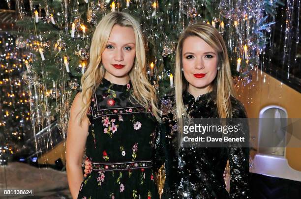 Emily Berrington and sister Katie Berrington attend Claridge's Christmas Tree Party 2017, designed by Karl Lagerfeld, on November 28, 2017 in London,...