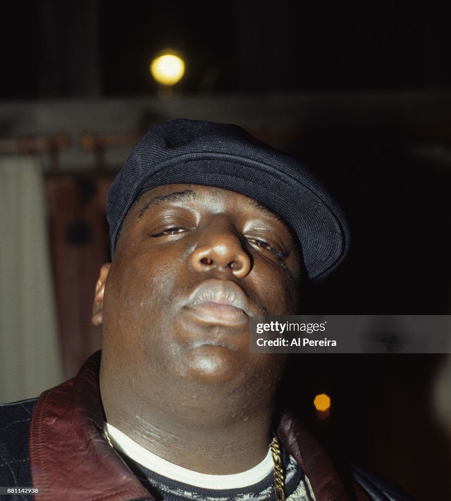 Biggie Rapping The Notorious B.I.G. aka Biggie Smalls poses for a portrait in 1994 ...