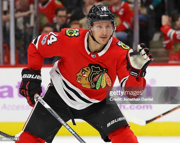 Richard Panik of the Chicago Blackhawks catches the puck against the Anaheim Ducks at the United Center on November 27, 2017 in Chicago, Illinois....