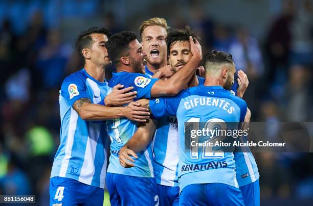 Adrian Gonzalez of Malaga CF celebrates after scoring goal during the Copa match between Malaga CF and Numancia at La Rosaleda Stadium on November...