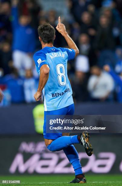 Adrian Gonzalez of Malaga CF celebrates after scoring goal during the Copa match between Malaga CF and Numancia at La Rosaleda Stadium on November...