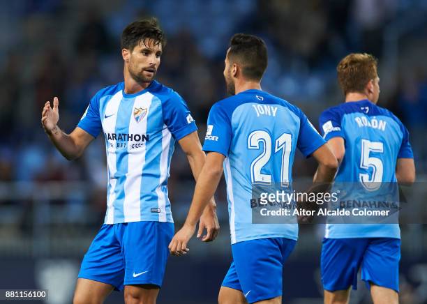 Adrian Gonzalez of Malaga CF celebrates after scoring goal during the Copa match between Malaga CF and Numancia at La Rosaleda Stadium on November...