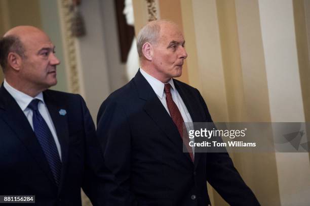White House Chief of Staff John Kelly, right, and National Economic Council Director Gary Cohn, arrive for a meeting with President Donald Trump at...