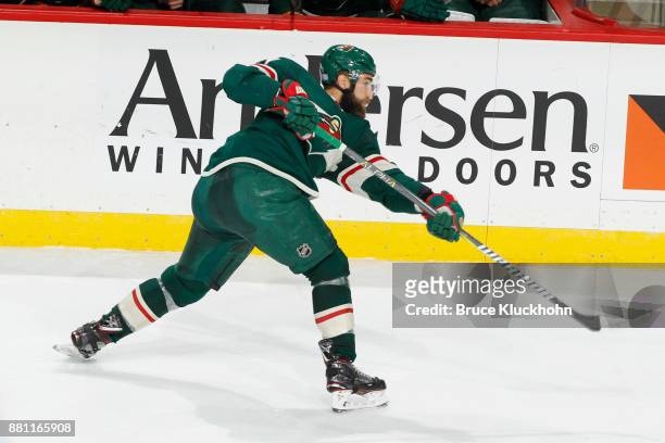Kyle Quincey of the Minnesota Wild shoots the puck against the New Jersey Devils during the game at the Xcel Energy Center on November 20, 2017 in...