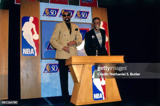 Legends Wilt Chamberlain and Bill Russell smile during a press conference to announce the 50 Greatest Players in NBA History on October 29, 1996 in...