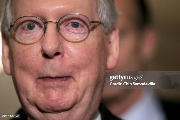 Senate Majority Leader Mitch McConnell talks with reporters following the weekly Senate Republican Policy Committee luncheon in the U.S. Capitol...