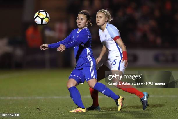 Kazakhstan's Saule Karibayeva and England's Steph Houghton battle for the ball during the 2019 Women's World Cup Qualifying, Group One match at the...