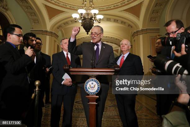 Senate Minority Leader Charles Schumer is joined by Senate Minority Whip Dick Durbin and Sen. Ben Cardin while talking to reporters following the...