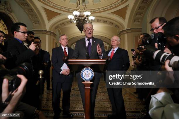 Senate Minority Leader Charles Schumer is joined by Senate Minority Whip Dick Durbin and Sen. Ben Cardin while talking to reporters following the...
