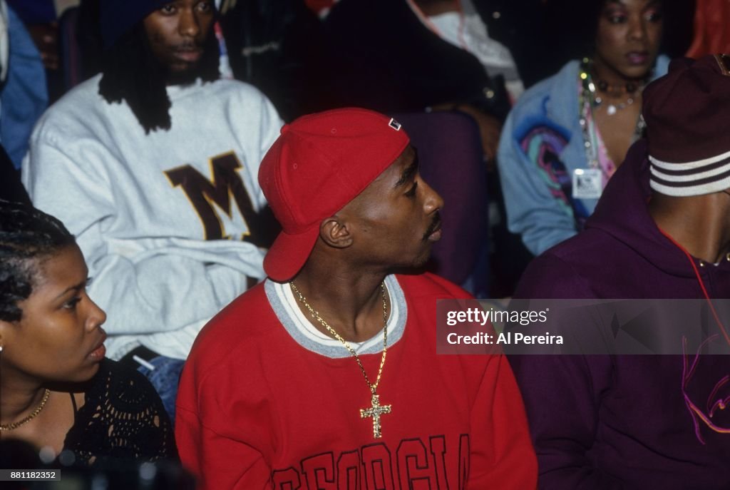 Is Tupac A Rapper Rapper Tupac Shakur watches as DMC performs onstage at the Madison ...