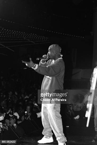 Rapper Tupac Shakur performs 'Out on Bail' onstage at the Madison Square Garden’s Paramount Theater during the first Source Awards on April 25, 1994...