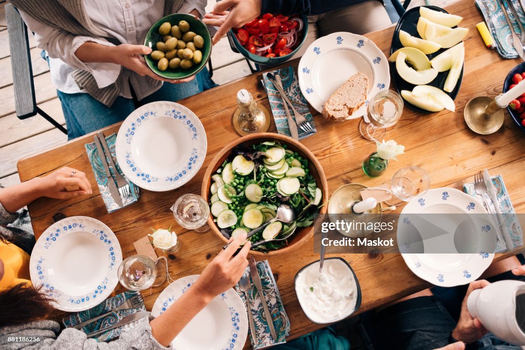 High angle view of friends having lunch together