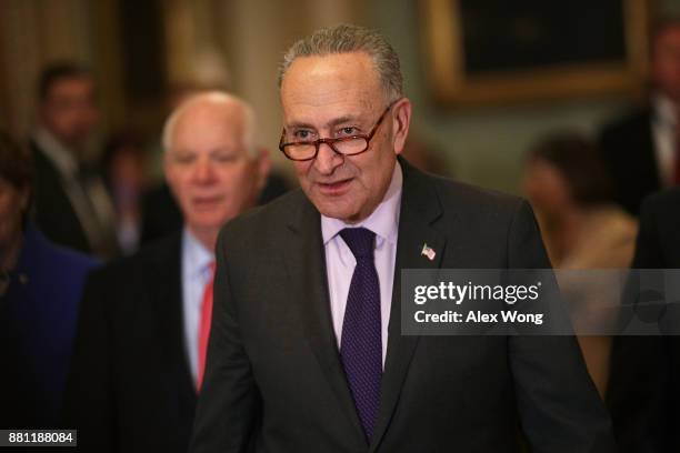 Senate Minority Leader Sen. Chuck Schumer and Sen. Ben Cardin approach the podium for a news briefing after a weekly Senate Democratic Policy...