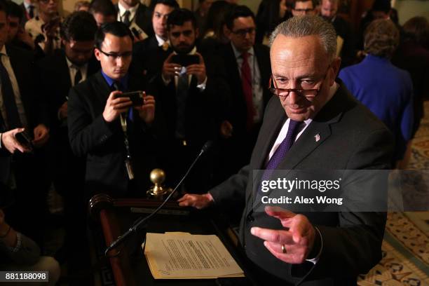 Senate Minority Leader Sen. Chuck Schumer speaks during a news briefing after a weekly Senate Democratic Policy Luncheon at the Capitol November 28,...