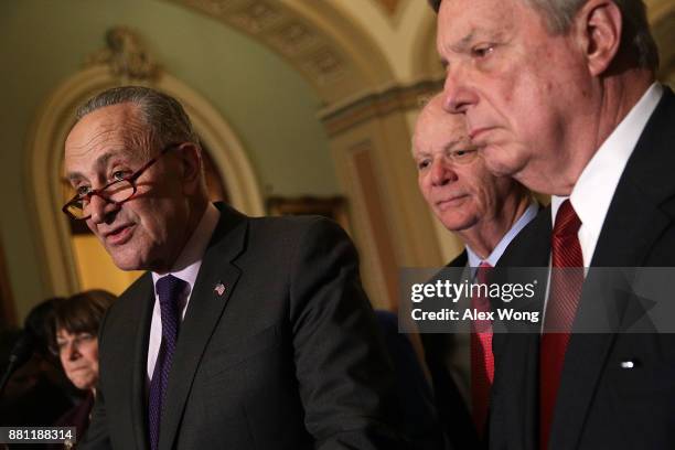 Senate Minority Leader Sen. Chuck Schumer speaks as Senate Minority Whip Sen. Dick Durbin , Sen. Ben Cardin , and Sen. Amy Klobuchar listen during a...