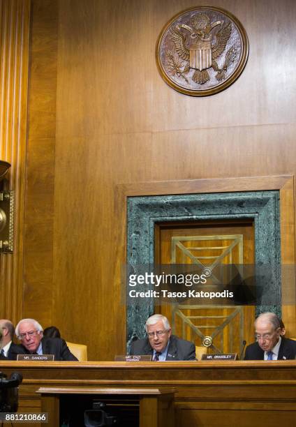 Sen. Bernie Sanders , Senate Budget Committe Chairman Mike Enzi and Sen. Chuck Grassley attend the full committee markup of the tax reform...