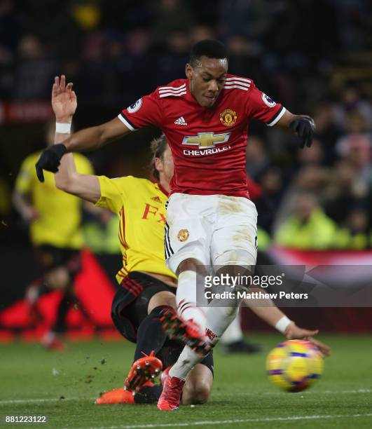 Anthony Martial of Manchester United scores their third goal during the Premier League match between Watford and Manchester United at Vicarage Road...