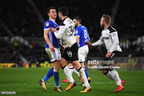Jonas Knudsen of Ipswich Town and George Thorne of Derby County confront each other during the Sky Bet Championship match between Derby County and...
