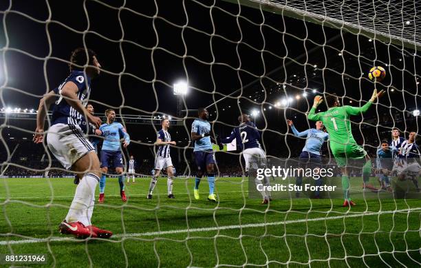 Newcastle captain Ciaran Clark heads in Newcastle's first goal during the Premier League match between West Bromwich Albion and Newcastle United at...