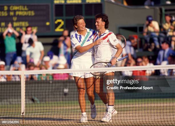 Doubles partners Jo Durie and Jeremy Bates both of Great Britain celebrate after defeating Nicole Provis and Darren Cahill both of Australia in the...