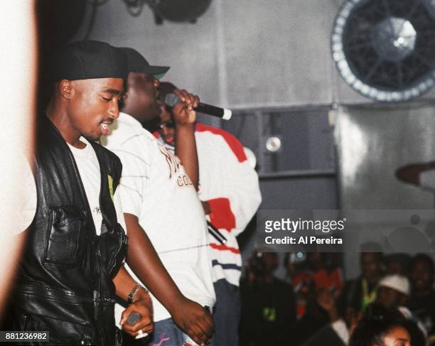 Rappers Tupac Shakur, The Notorious B.I.G. Aka Biggie Smalls and Puff Daddy perform onstage at the Palladium on July 23, 1993 in New York, New York.