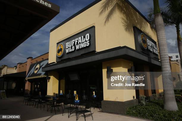 Buffalo Wild Wings restaurant is seen on November 28, 2017 in Miami, Florida. Today, Arby's Restaurant Group announced it reached a deal to acquire...