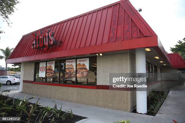 An Arby's restaurant is seen on November 28, 2017 in Miami, Florida. Today, Arby's Restaurant Group announced it reached a deal to acquire Buffalo...