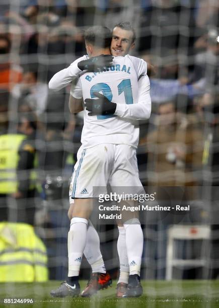 Borja Mayoral of Real Madrid celebrates with Gareth Bale after scoring their team's second goal during the Copa del Rey round of 32 second leg match...