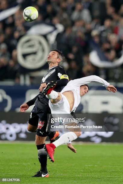 Jeremy Toulalan of Bordeaux and Vincent Pajot battle for the ball during the Ligue 1 match between FC Girondins de Bordeaux and AS Saint-Etienne at...