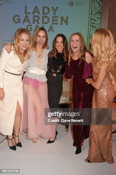 Poppy Jamie, Suki Waterhouse, Melanie C, Chloe Delevingne and Clara Paget attend the Lady Garden Gala in aid of Silent No More Gynaecological Cancer...