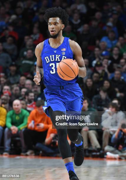 Duke forward Marvin Bagley III brings the ball up court in the championship game of the Motion Bracket at the PK80-Phil Knight Invitational between...