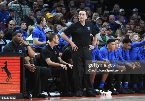 Duke Head Coach Mike Krzyzewski looks to the score board in the championship game of the Motion Bracket at the PK80-Phil Knight Invitational between...