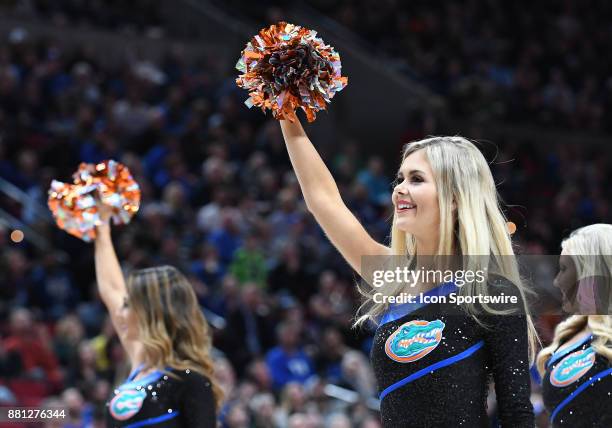 Florida Gators cheerleader performs in the championship game of the Motion Bracket at the PK80-Phil Knight Invitational between the Duke Blue Devils...