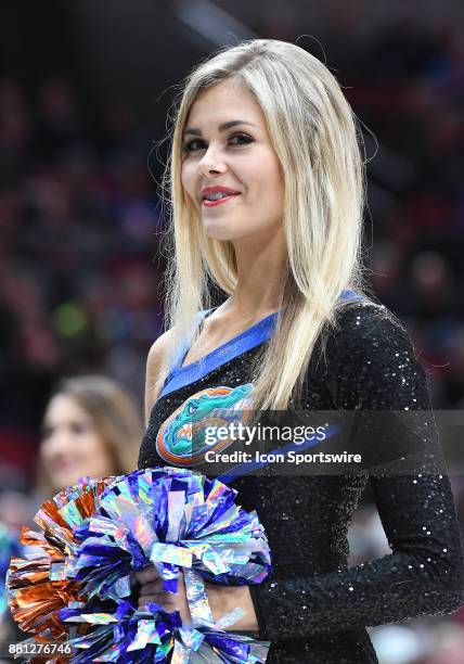 Florida Gators cheerleader performs in the championship game of the Motion Bracket at the PK80-Phil Knight Invitational between the Duke Blue Devils...