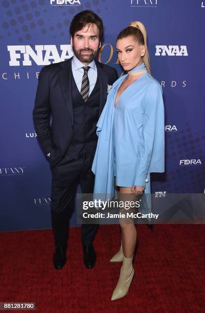 Michael Atmore of Footwear News and Hailey Baldwin attends the 31st FN Achievement Awards at IAC Headquarters on November 28, 2017 in New York City.