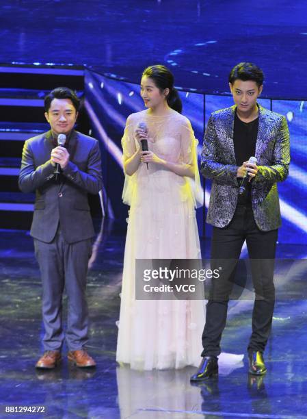 Actor Wong Cho-lam, actress Guan Xiaotong and actor Huang Zitao attend the opening ceremony of the 4th Silk Road International Film Festival on...