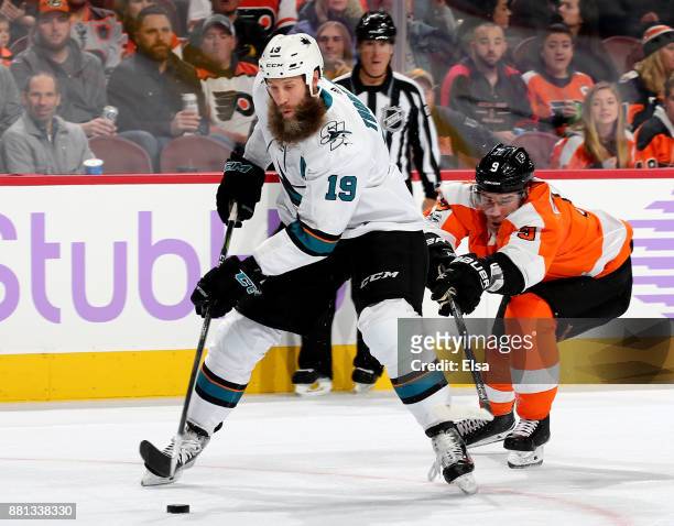 Joe Thornton of the San Jose Sharks heads for the net as Ivan Provorov of the Philadelphia Flyers defends on November 28, 2017 at Wells Fargo Center...