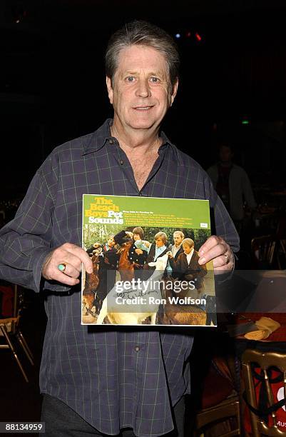 Brian Wilson, 2005 MusiCares Person of the Year, with an autographed copy of the 1966 Beach Boys album "Pet Sounds"