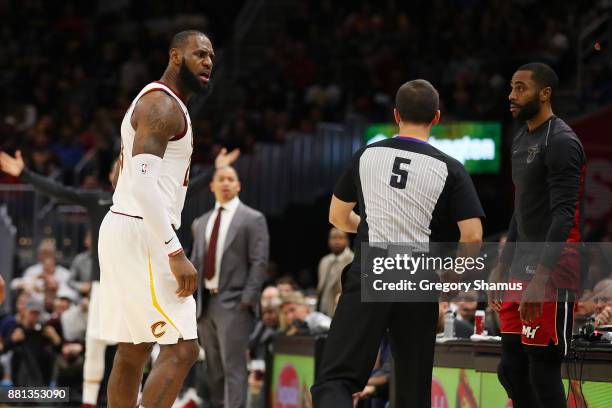 LeBron James of the Cleveland Cavaliers is ejected in the second half by referee Kane Fitzgerald while playing the Miami Heat at Quicken Loans Arena...