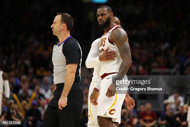 LeBron James of the Cleveland Cavaliers argues after being ejected in the second half by referee Kane Fitzgerald while playing the Miami Heat at...