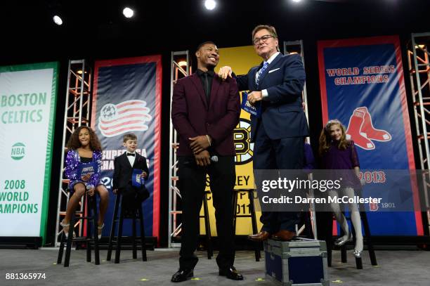 Boston Celtic Marcus Smart receives the Champions for Children's award and speaks with emcee Ed Harding at Seaport World Trade Center November 28,...