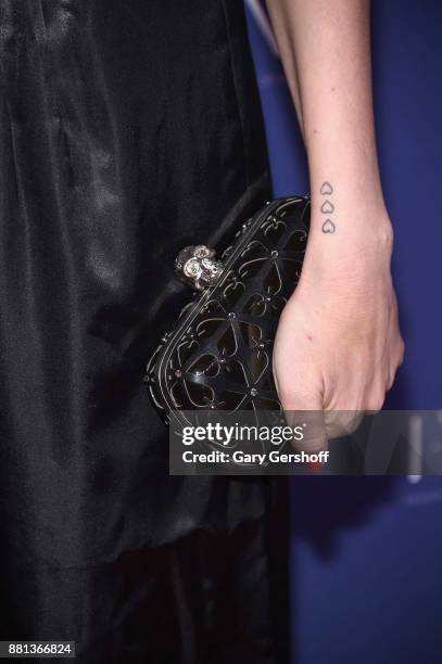 Author Jill Kargman, clutch and tattoo detail, attends the 31st FN Achievement Awards at IAC Headquarters on November 28, 2017 in New York City.