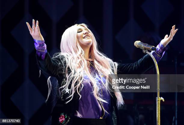 Kesha performs onstage at 106.1 KISS FM's Jingle Ball 2017 Presented by Capital One at American Airlines Center on November 28, 2017 in Dallas, Texas.
