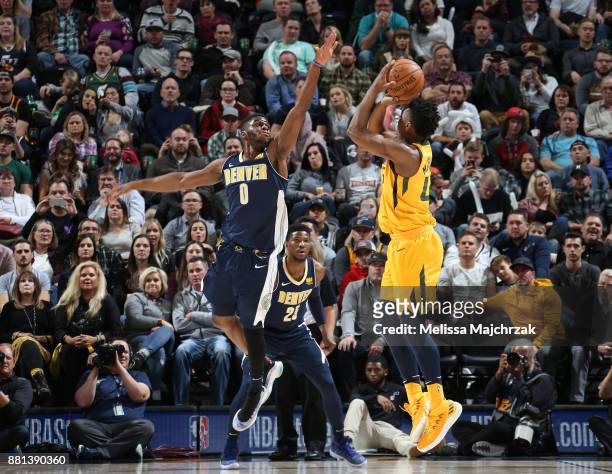 Emmanuel Mudiay of the Denver Nuggets blocks the shot against the Utah Jazz on November 28, 2017 at vivint.SmartHome Arena in Salt Lake City, Utah....