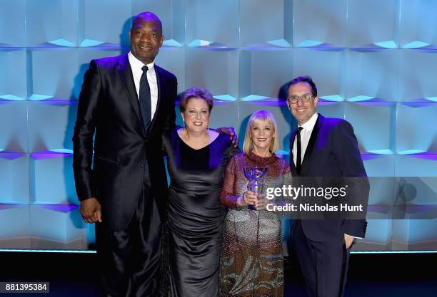 Dikembe Mutombo, Caryl M. Stern, Carol J. Hamilton and Nicolas Hieronimus speak onstage during 13th Annual UNICEF Snowflake Ball 2017 at Cipriani...