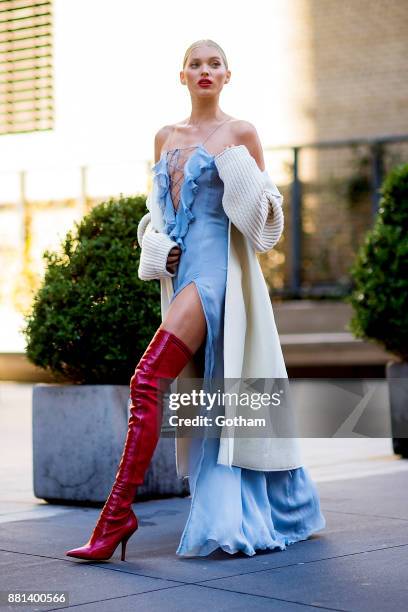 Elsa Hosk is seen wearing a Redemption dress and Versace shoes in Midtown on November 28, 2017 in New York City.